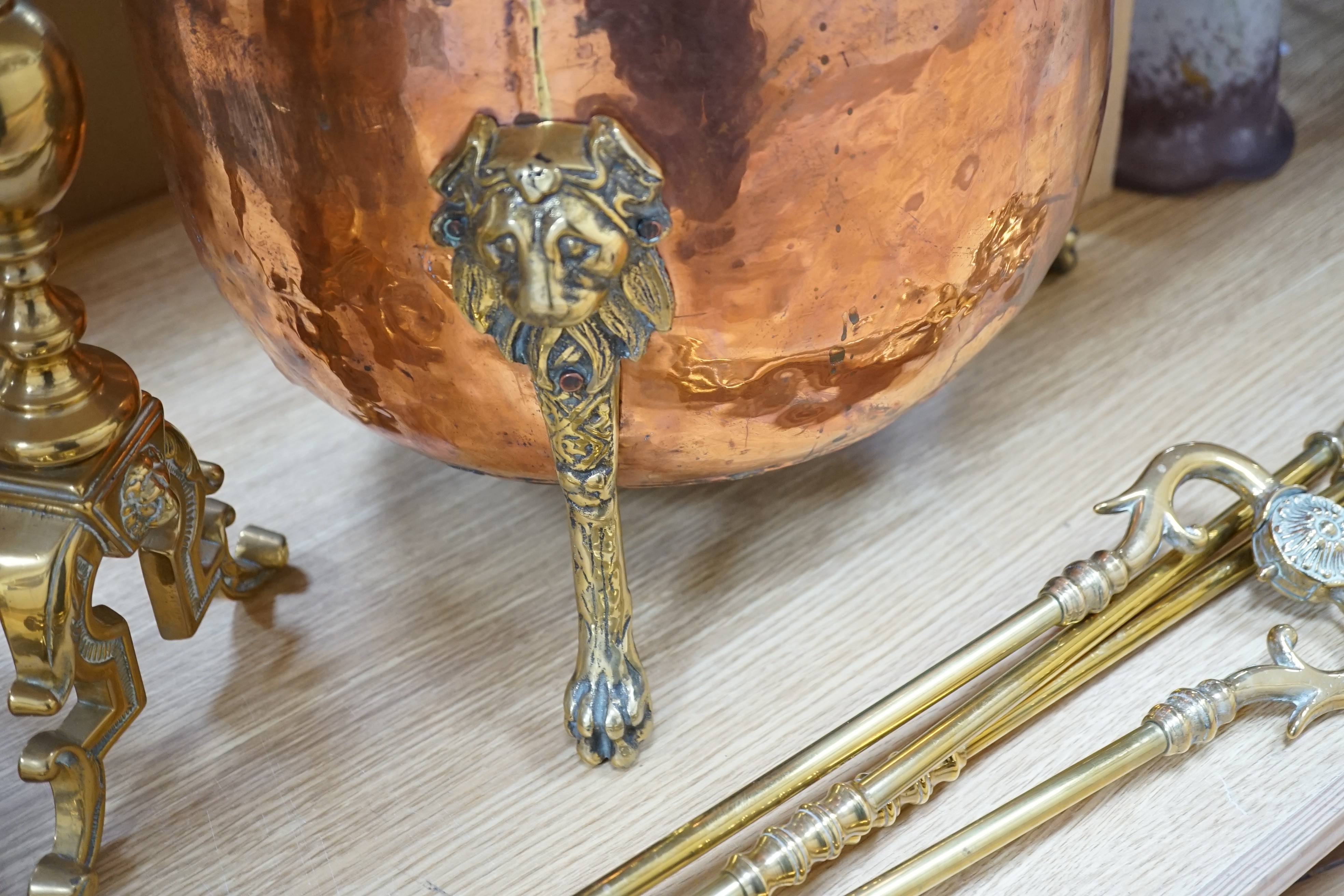 A set of three Victorian brass fire irons, a pair of fire dogs and a copper log bin